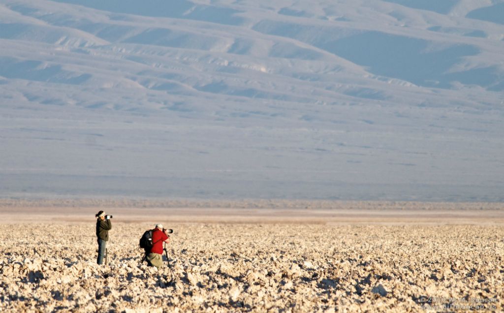 Photographer down low -- in the salt flat.