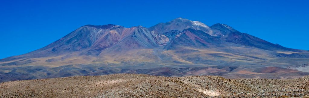 Mineral-rich Andean volcano.
