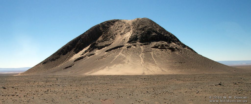 Volcanic structure on the hard pan near salt flats.