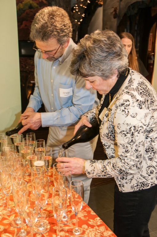 Craig and Jane Hannah prepare the champaign reception for high wattage donors.