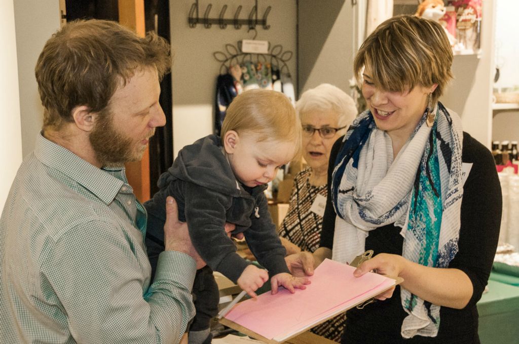 The youngest registrant checks in.