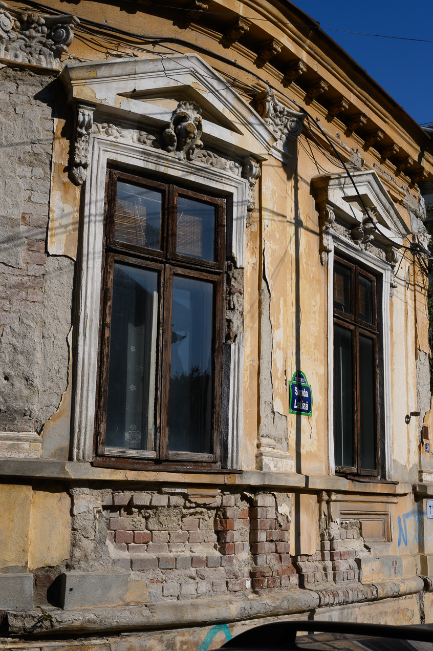 Many of the buildings off the main thoroughfares are crumbling from neglect.