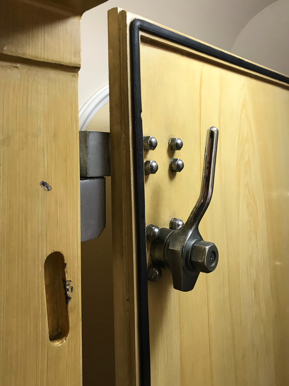 The door leading down to the atom-bomb proof shelter in the third sub-basement.